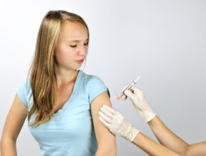 Teen getting HPV shot